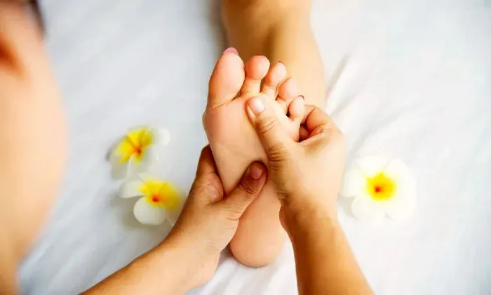 45-Minute full body massage with hot stones including foot massage